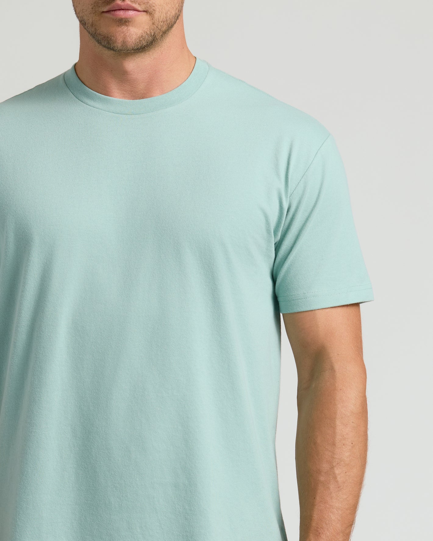 Seabreeze Classic Crew Neck on man, light mint-green shade.
