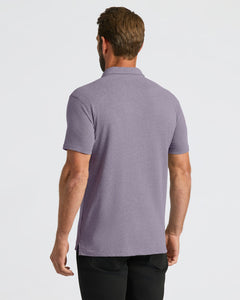 True ClassicBack view of man in Dark Heather Amethyst Short Sleeve Polo.