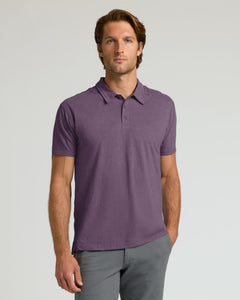 True ClassicMan wearing a purple polo shirt against a gray background