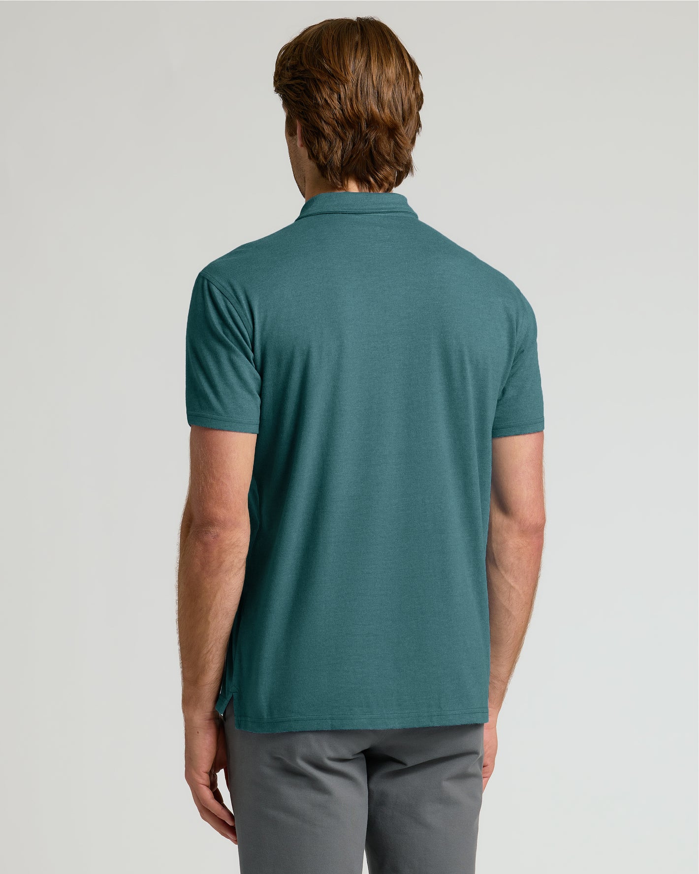 Heather Seafarer Classic Polo from the back, showcasing fit.