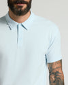 Man wearing Icicle Classic Polo with tattooed forearm.