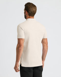 True ClassicBack view of man wearing Oatmeal Classic Polo, highlighting fit and side vents.