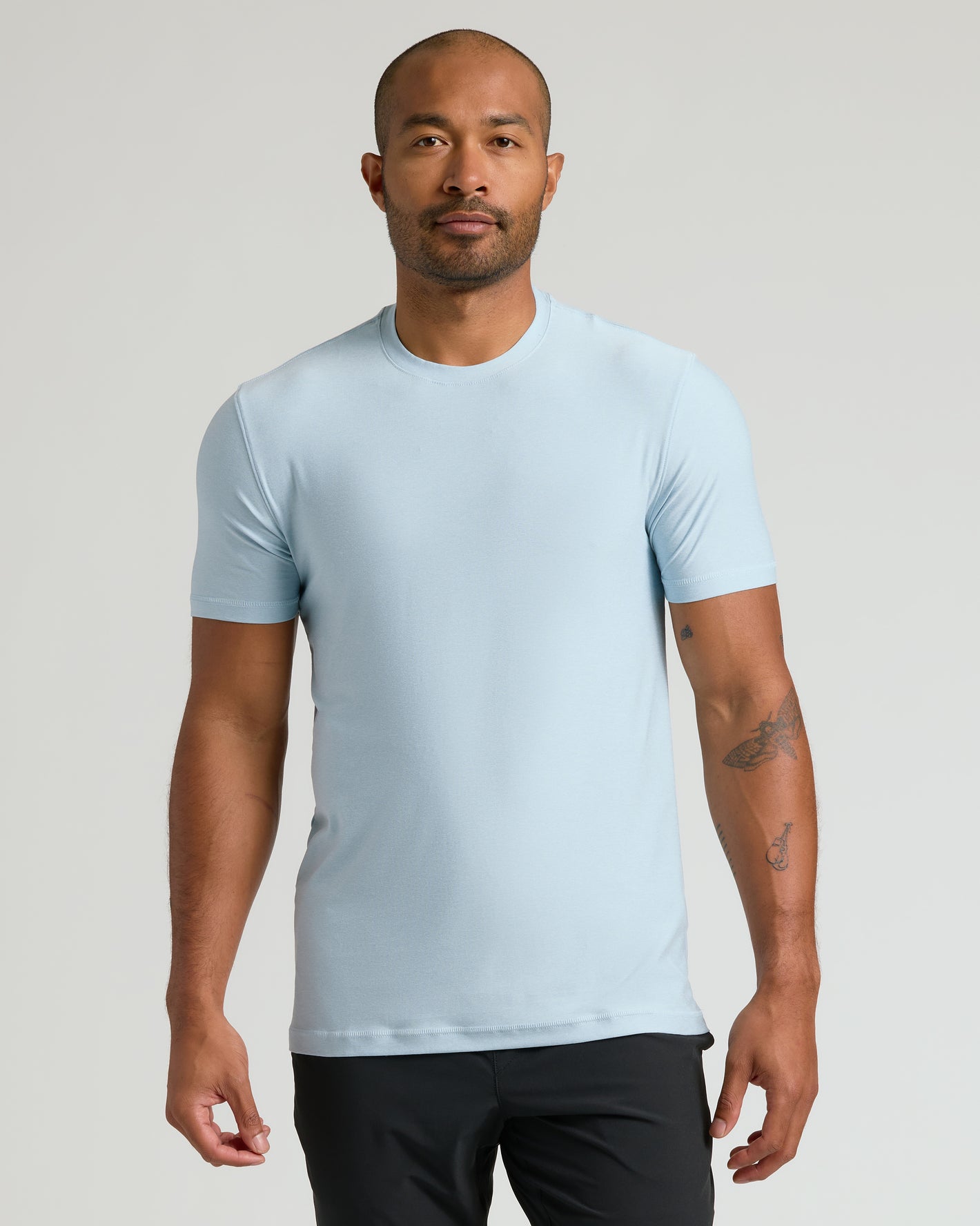 Man wearing Limited Spring Active Crew 6-Pack T-shirt, relaxed pose.