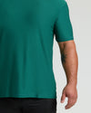 Clover Active Crew Neck Tee on torso with palm-tree tattoo.