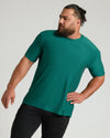 Clover Active Crew Neck Tee worn by bearded man, casual pose.