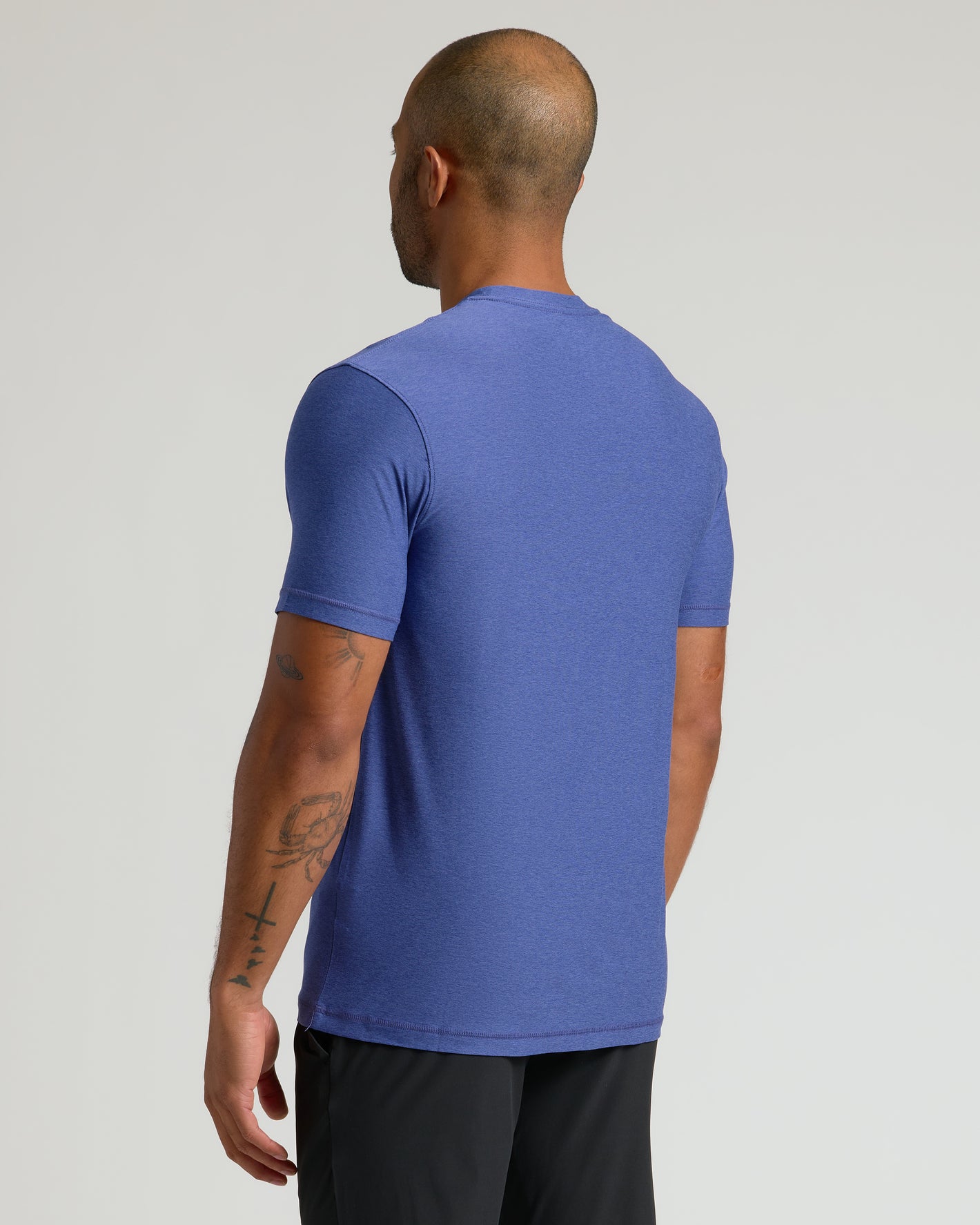 Cosmos Active Crew Neck Tee from back, tattoos visible.