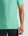 Fern Active Crew Neck Tee on model, showcasing mint-green color and short sleeves.