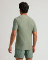 Back view of Heather Juniper Active Crew Neck Tee on a man.