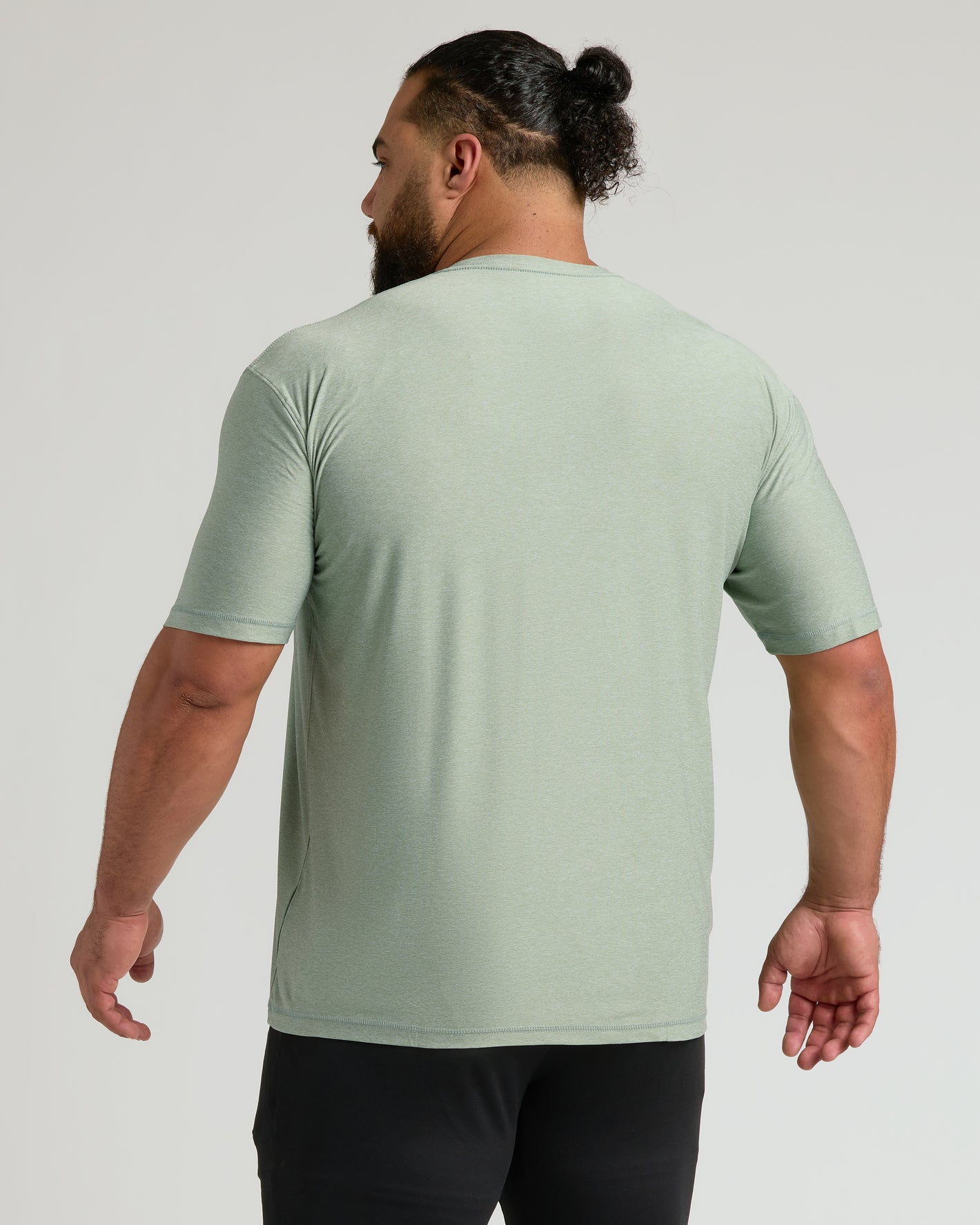 Back view of Lichen Active Crew Neck Tee on man.