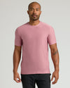 Man in muted pink Limited Spring Active Crew T-shirt, athletic pants.