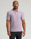 Iris Active Polo 2.0 worn by tattooed man, neutral expression.