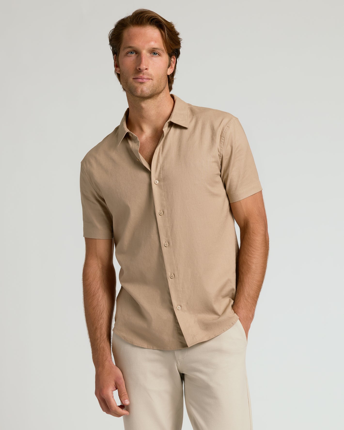 Dusty Taupe and Moss Oak Short Sleeve Linen Shirt 2-Pack worn by man.