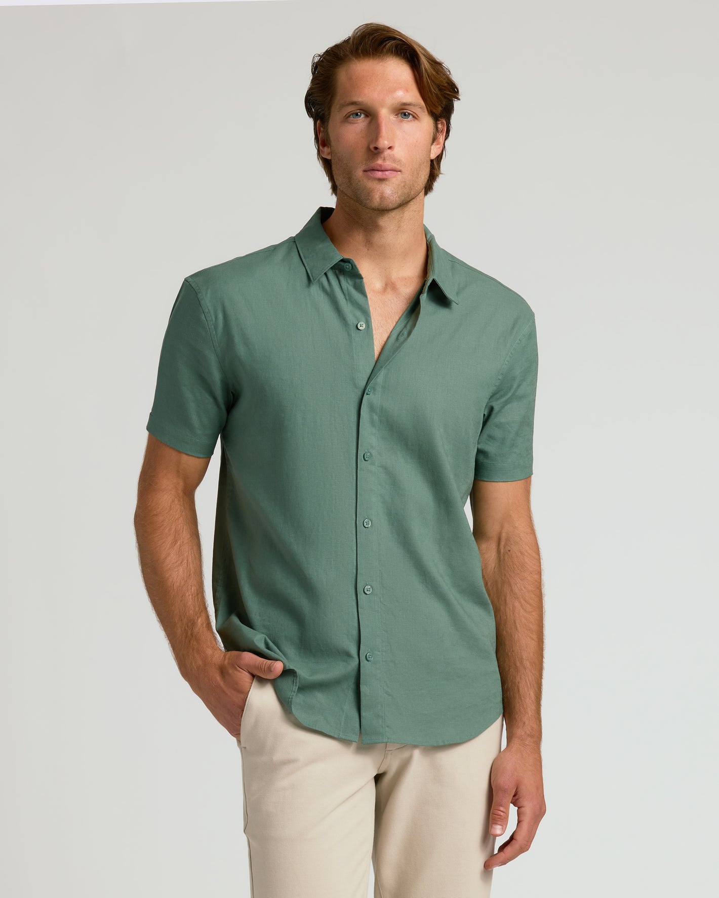 Man wearing The Staple Short Sleeve Linen Shirt, relaxed fit.