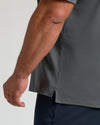 Carbon Premium Pima Polo sleeve detail, showcasing silky, breathable fabric.