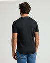 Black Premium Pima Crew Curved Hem 4-Pack T-shirt, highlighting tailored fit and tattoos.