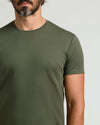 Man wearing All Grove Pima Cotton Blend Curved Hem Crew T-shirt.