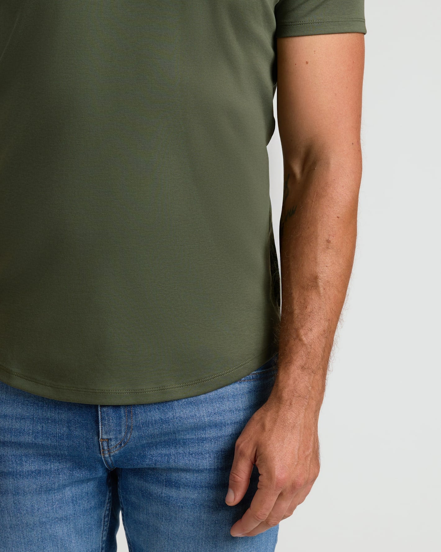 All Grove Pima Cotton Blend Curved Hem Crew on man in jeans.