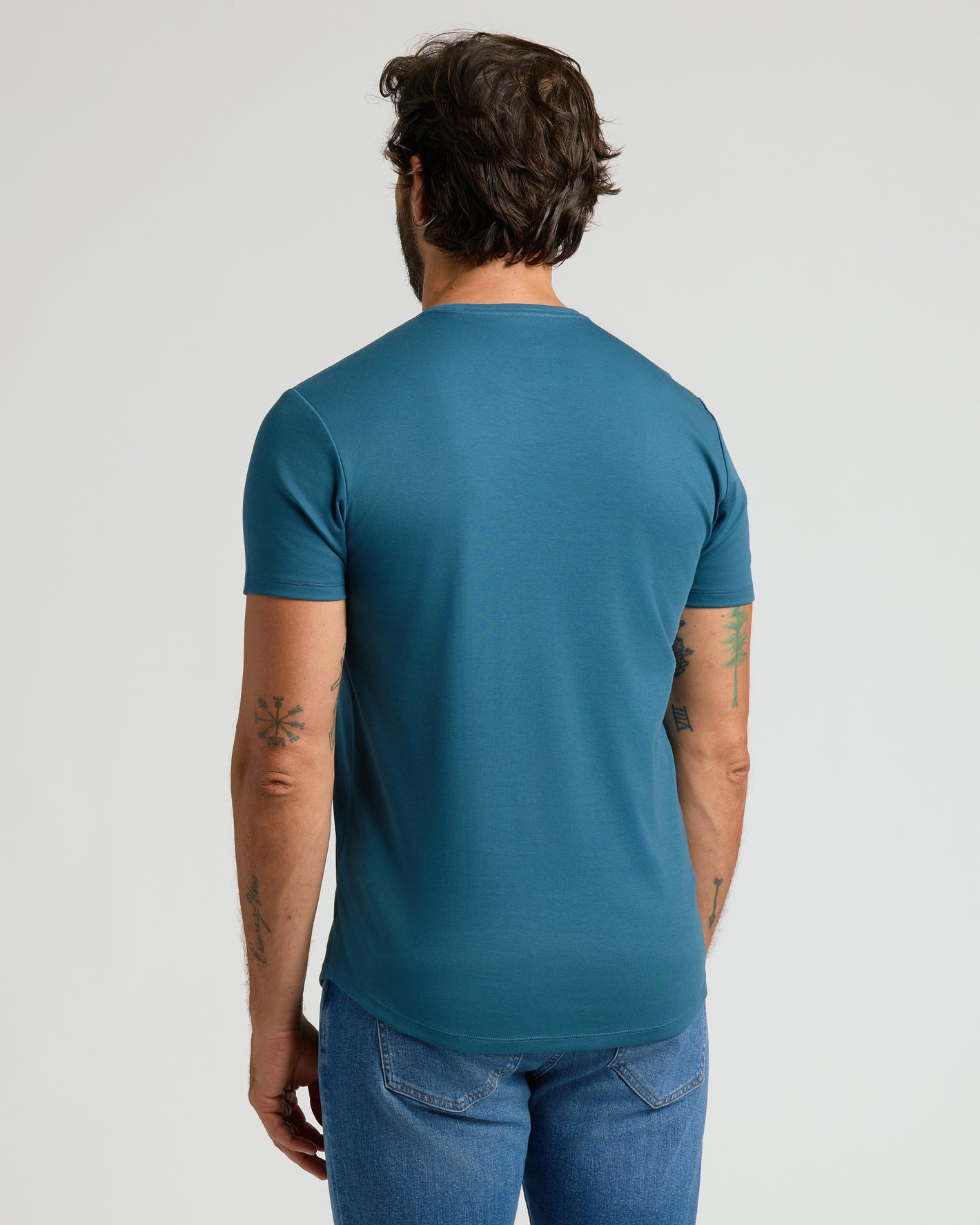 Lagoon Premium Pima Crew Curved Hem T-shirt on man, back view.