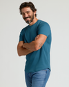 Man in Lagoon Premium Pima Crew Curved Hem tee.