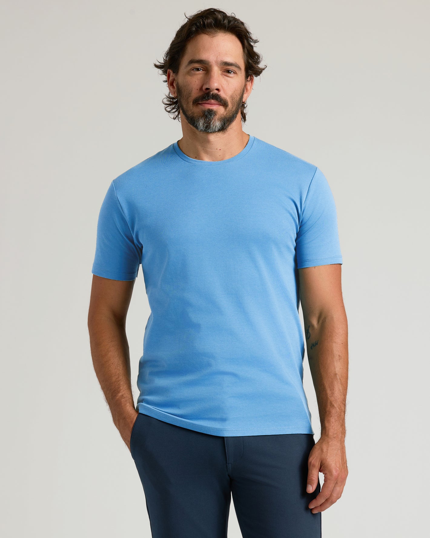Cerulean Premium Pima Crew Neck on man with navy trousers.