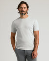 Man wearing Vapor Premium Pima Crew Neck in light gray, relaxed stance.