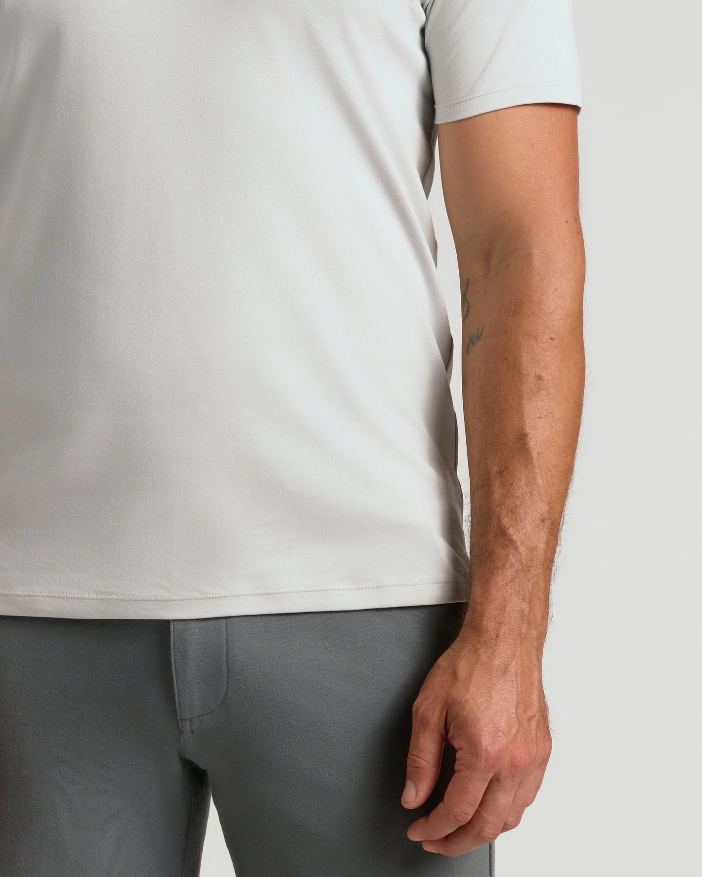 Premium Pima Crew 7-Pack: Light-gray tee with fitted dark-gray pants.