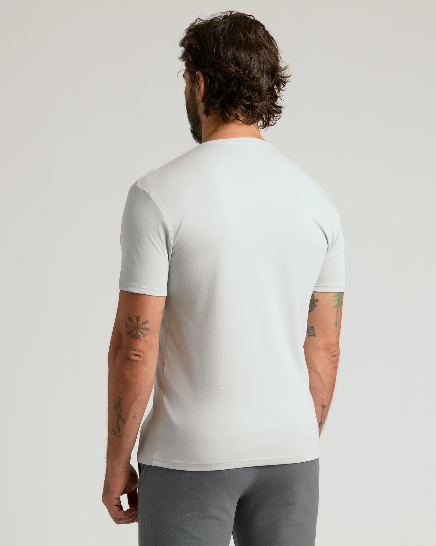 Back view of model in Vapor Premium Pima Crew Neck.