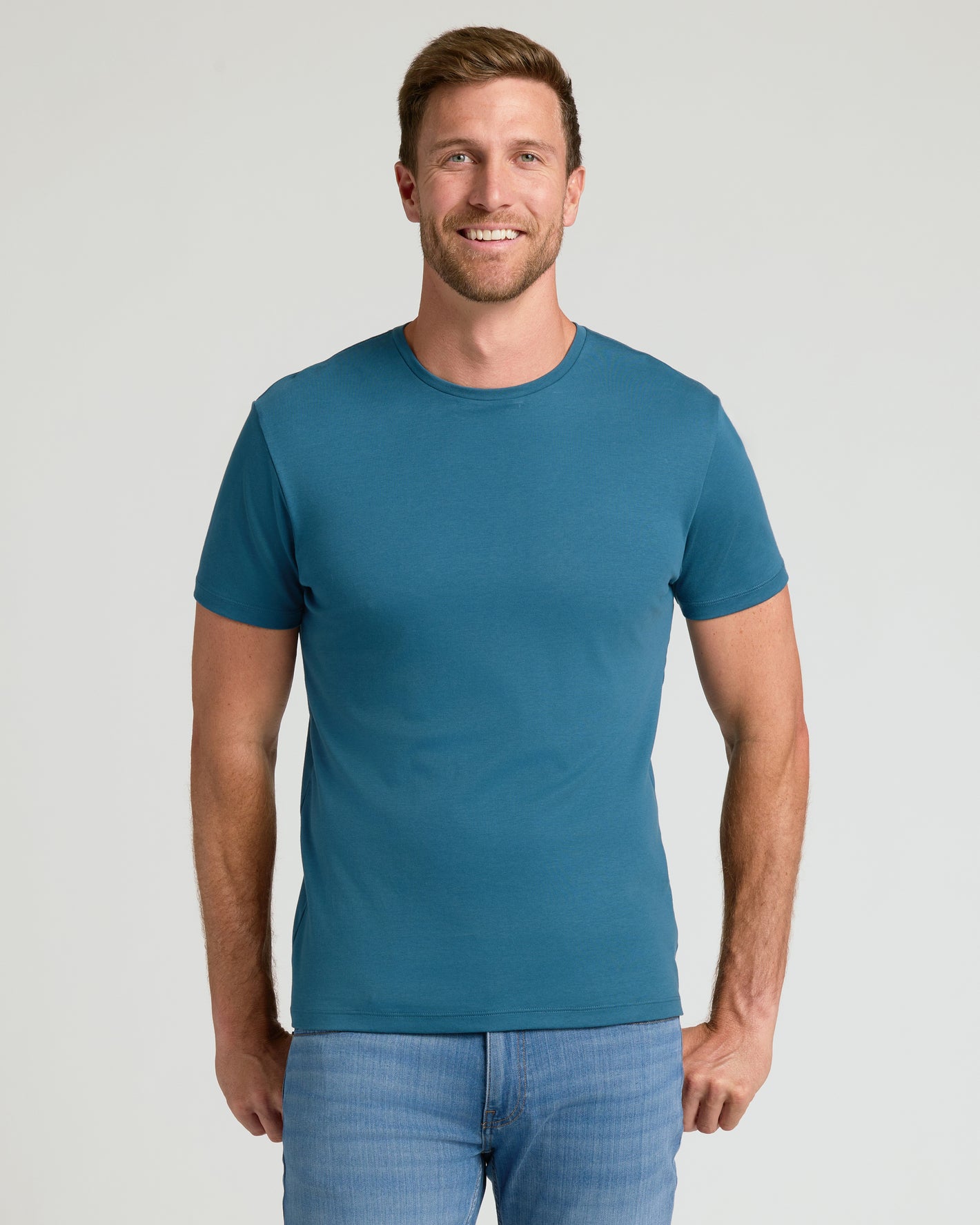 Man wearing Lagoon Premium Pima Crew Neck, displaying its relaxed, refined fit.