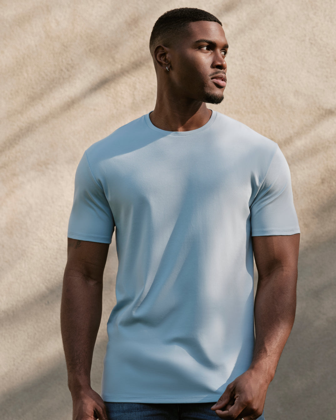 Ether Tall Premium Pima Crew Neck worn by man in sunlight.