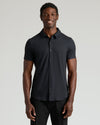 Man wearing Black Short Sleeve Comfort Knit Shirt, showcasing its fitted, casual style.