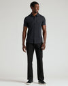 Man modeling Black Short Sleeve Comfort Knit Shirt with relaxed pose.
