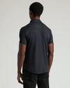 Back view of man in Black Short Sleeve Comfort Knit Shirt.
