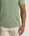 Dark Heather Bay Green Classic V-Neck on model with tattooed arm.