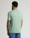 Heather Slate Green Classic V-Neck, short-sleeve, on model with tattoos.
