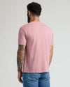 Back view of a model in Light Heather Boysenberry Classic V-Neck.