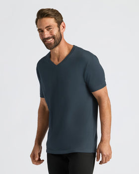 Man wearing Seasonal Classic V-Neck 3-Pack T-shirt, smiling.