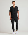 Black Active V-Neck on male model with joggers and sneakers.