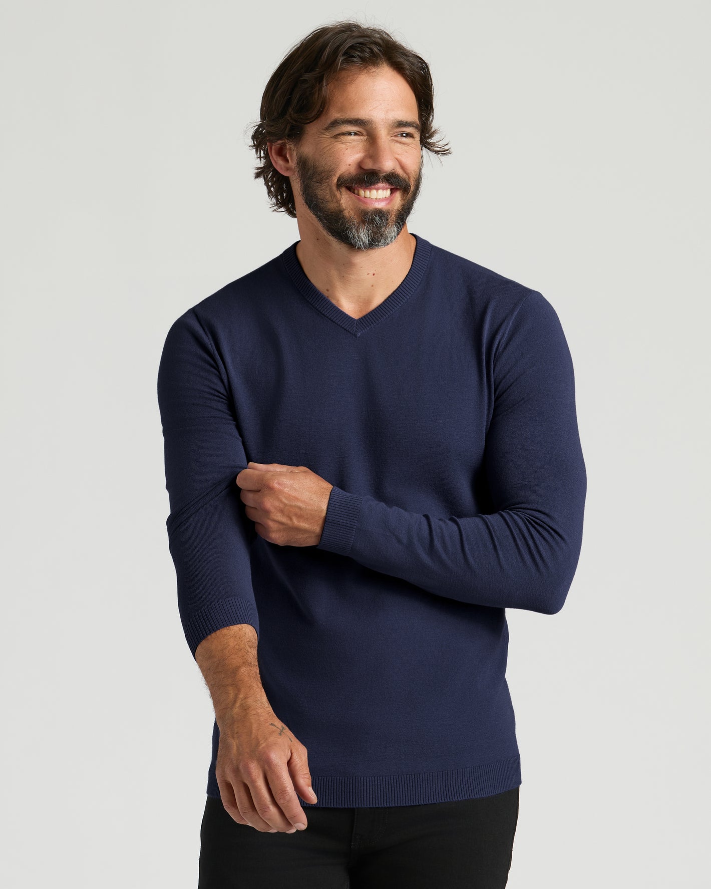 Navy Dressy V-Neck Sweater on model, showing comfortable, refined fit.