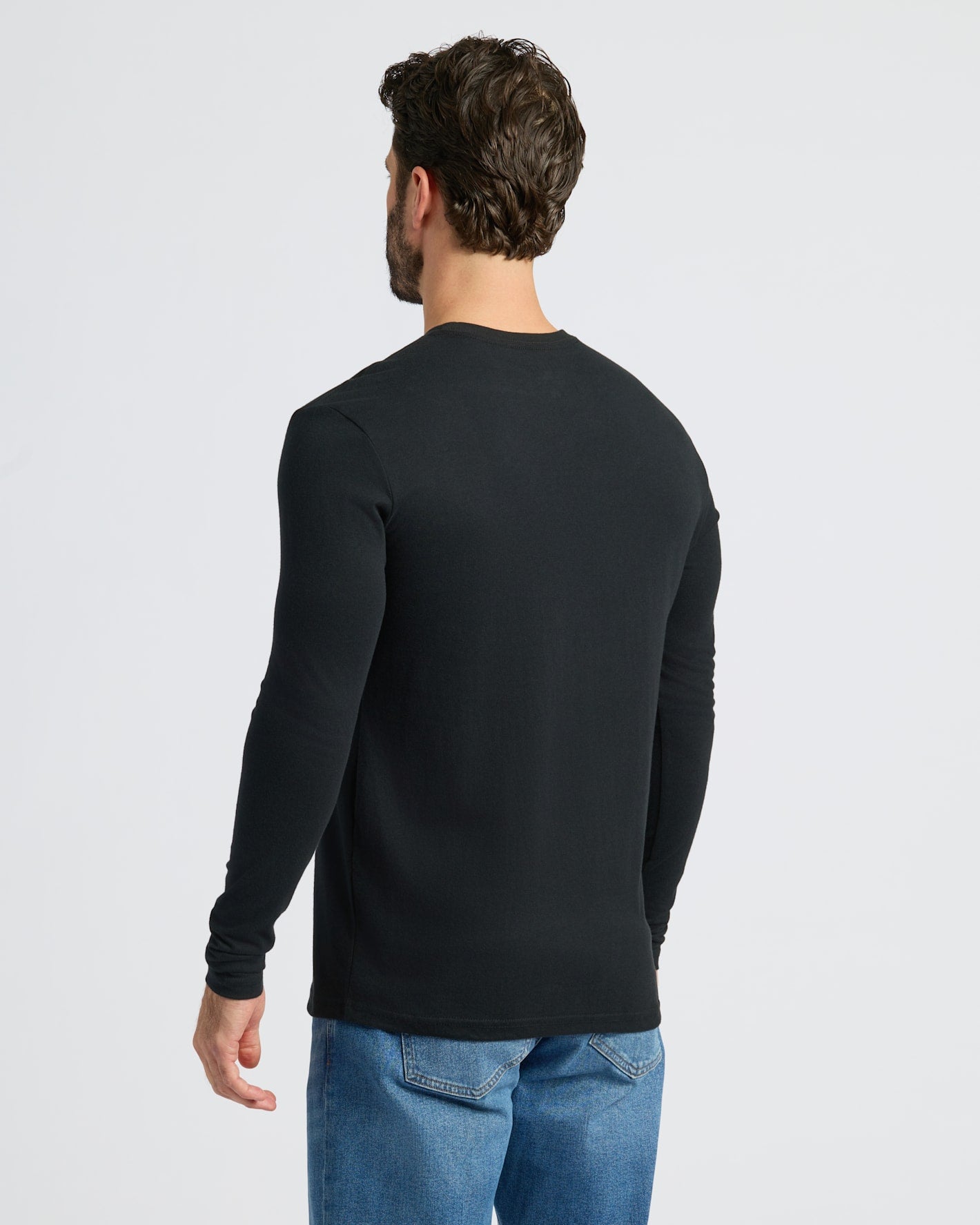 Black Classic Long Sleeve Crew Neck 10-Pack, back view on male model.