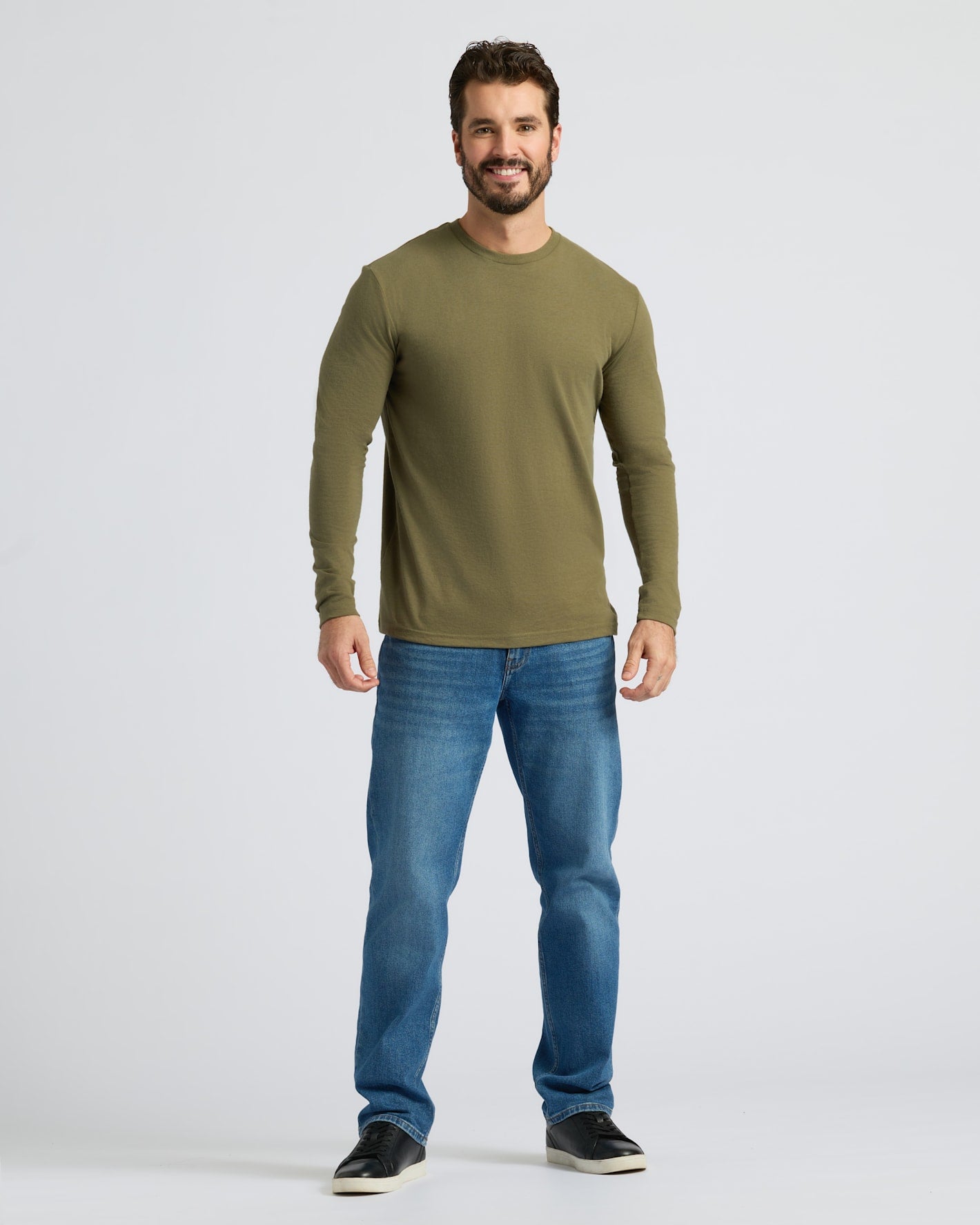 Man in Classic Long Sleeve 3-Pack outfit, smiling.
