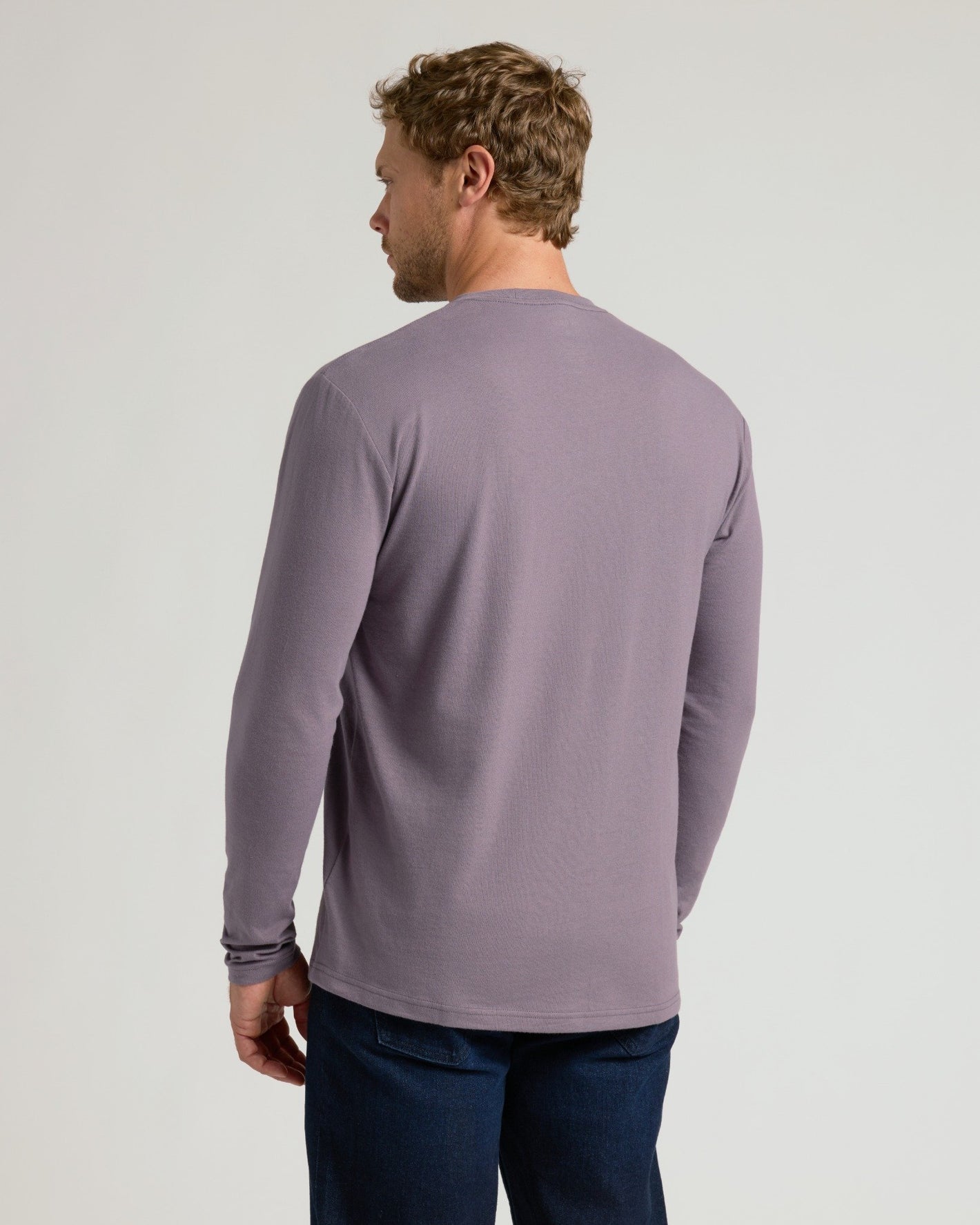 Man in Ashberry Classic Long Sleeve Crew Neck, athletic fit.