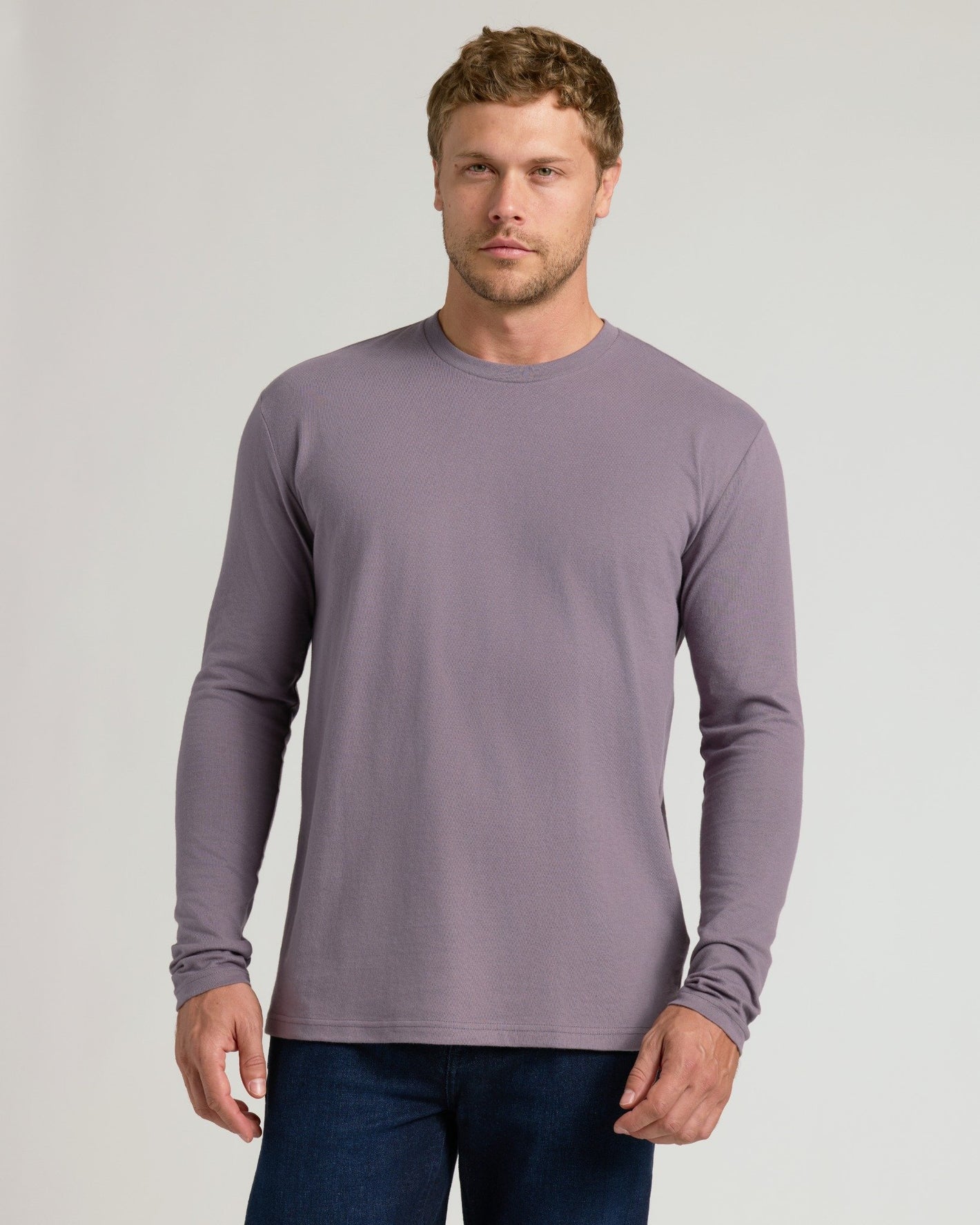 Man in Ashberry Classic Long Sleeve Crew Neck, athletic fit.