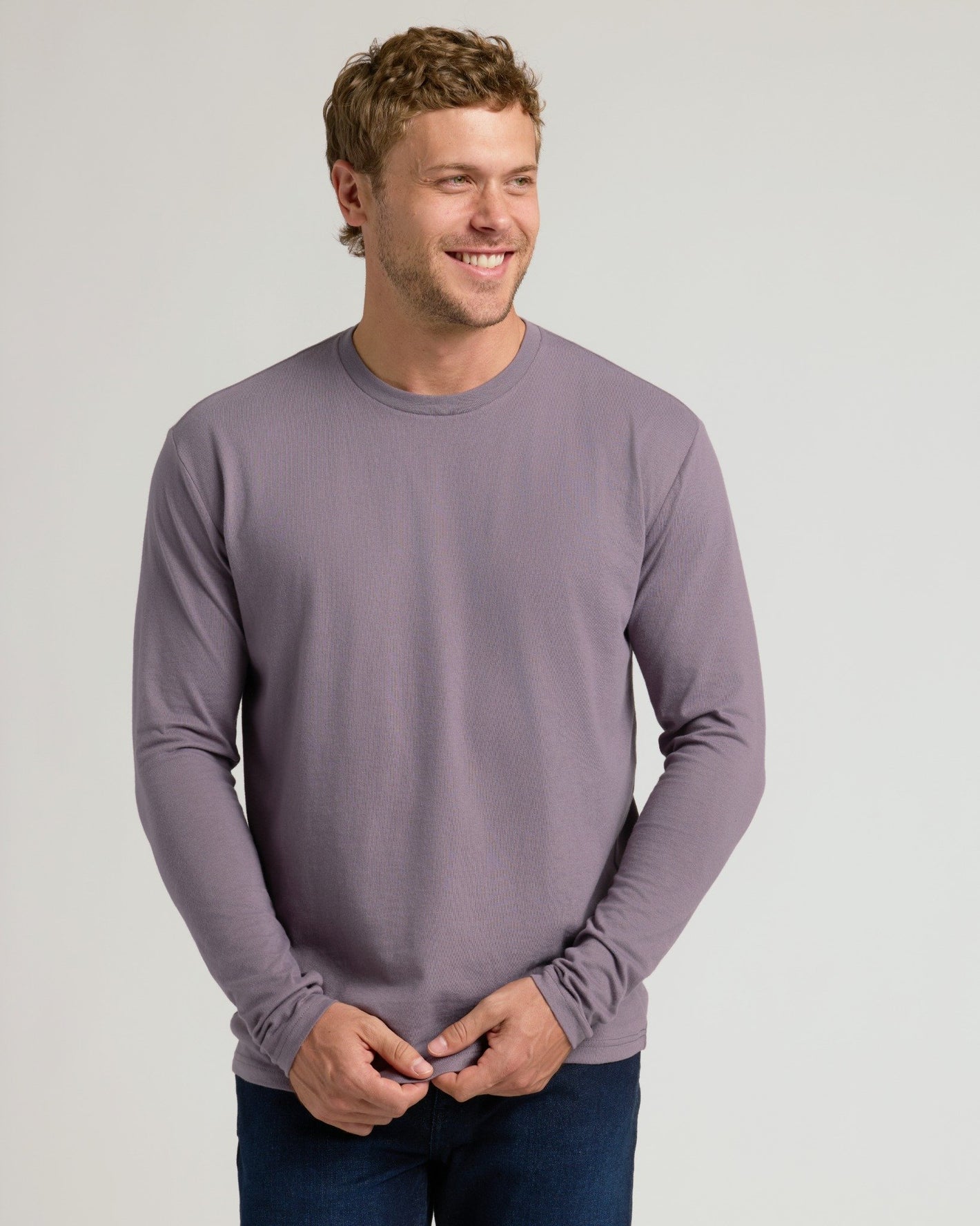 Young man in lavender Seasonal Classic Long Sleeve Crew.