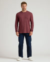 Man wearing Dark Heather Clovewood Classic Long Sleeve Crew Neck.