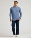 Model in Seasonal Classic Long Sleeve Henley, muted blue shade.