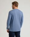 Back view of man in Dark Heather Vintage Navy Classic Long Sleeve Crew Neck.