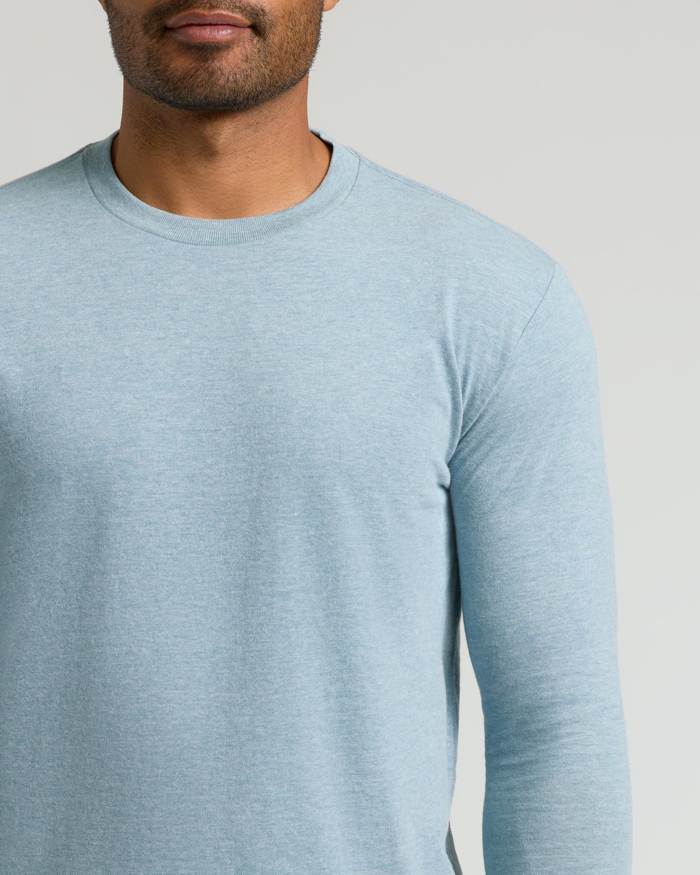 Heather Sapphire Classic Long Sleeve Crew Neck worn by model, showcasing fit.