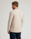 Man wearing Heather Truffle Classic Long Sleeve Crew Neck, viewed from behind.