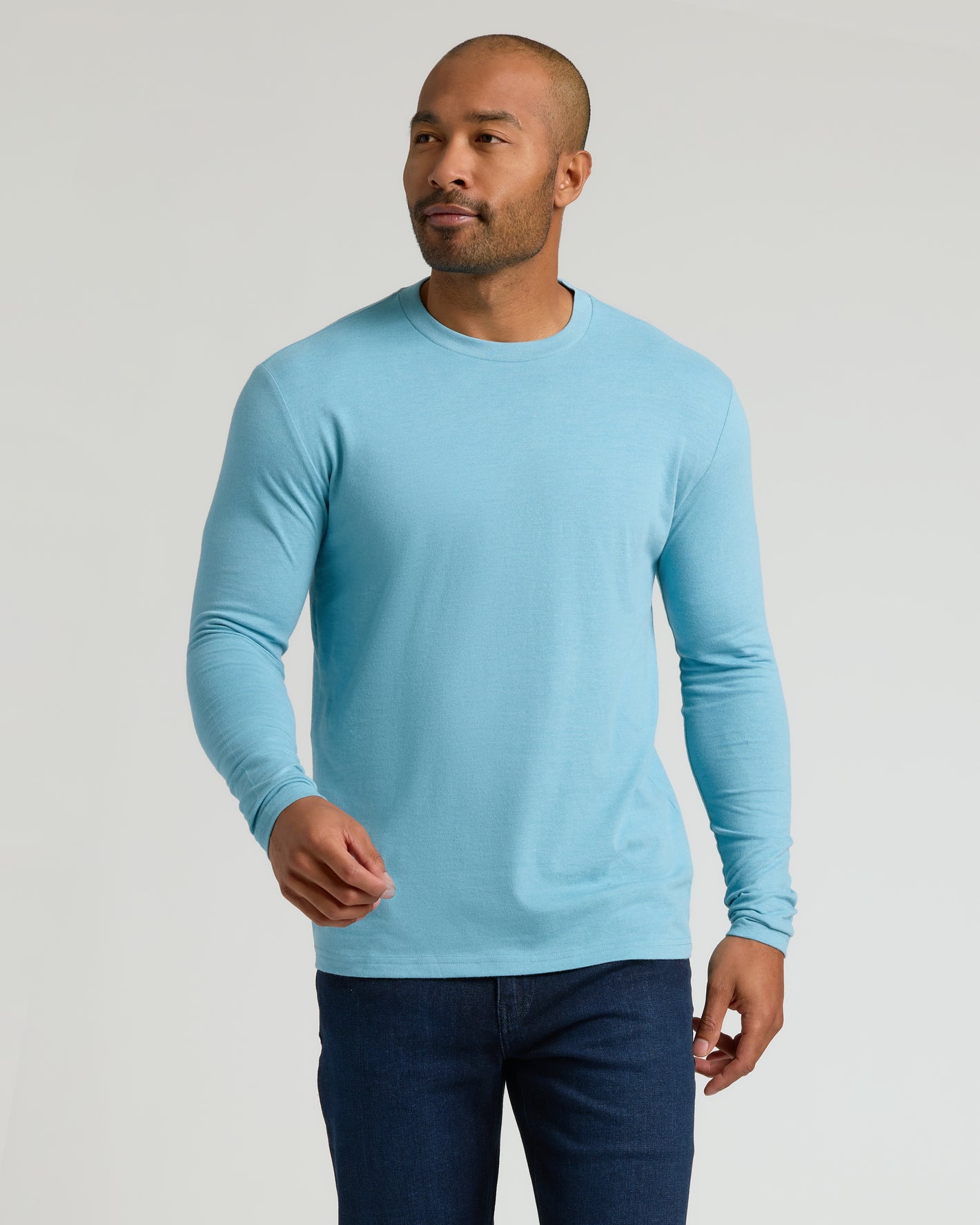 Heather Voyager Classic Long Sleeve Crew Neck on model mid-stride.