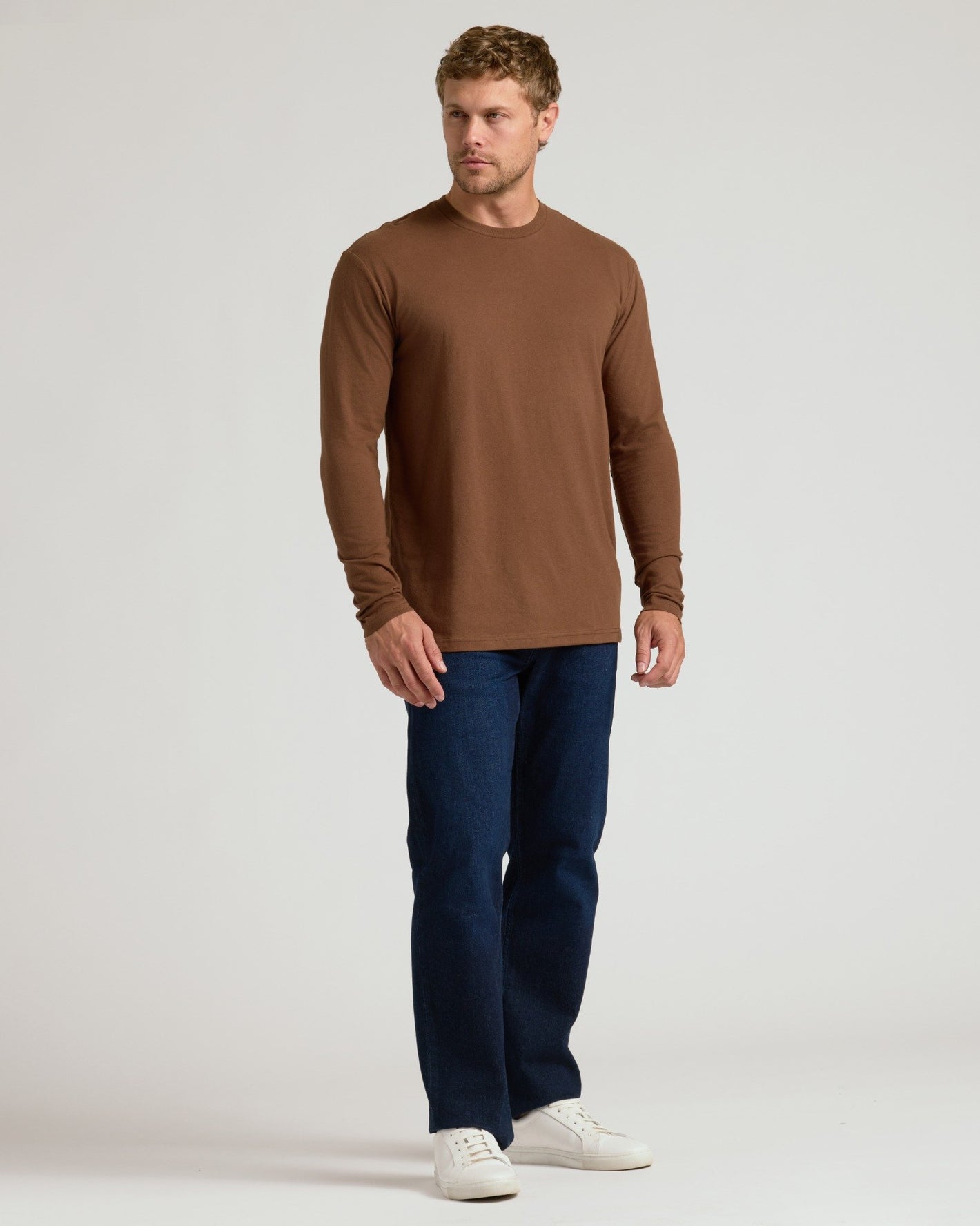 Man models Seasonal Classic Long Sleeve Henley from the 6-Pack collection.